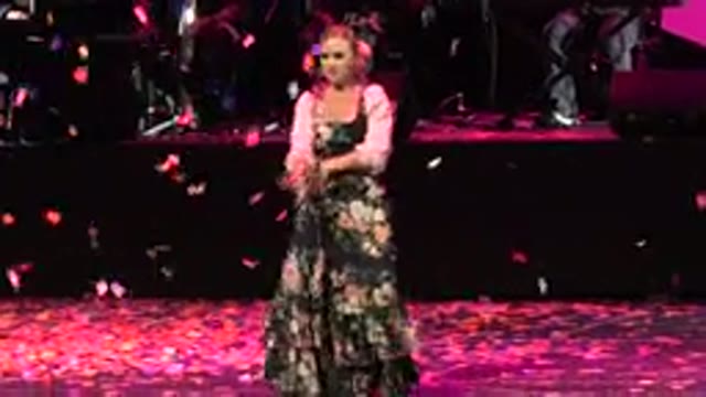 CABO SAN LUCAS MEXICO-2019: Woman Swaying in Beautiful Dress as Petals Rain from Ceiling