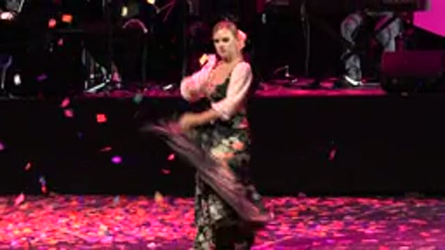 CABO SAN LUCAS MEXICO-2019: Dancing Woman Swinging Her Skirt On Stage With Band