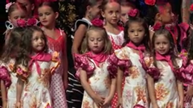 CABO SAN LUCAS MEXICO-2019: A Group Of Little Girls In Matching Costumes Performing On Stage