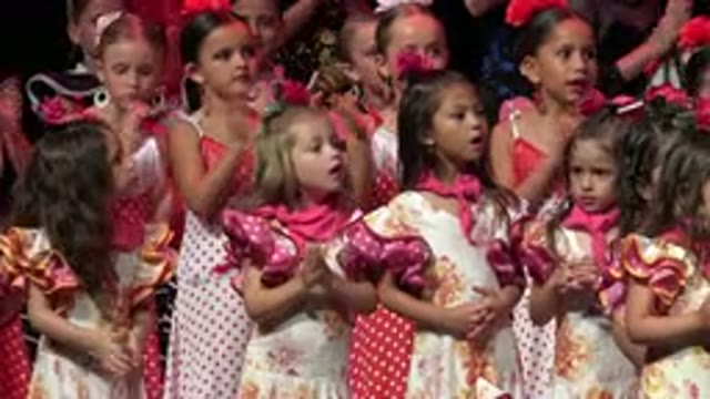 CABO SAN LUCAS MEXICO-2019: Girls Wearing Pink And White Dresses Clap Hands