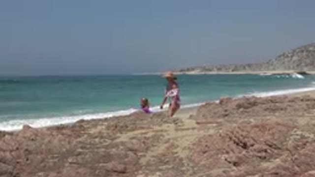 CABO SAN LUCAS MEXICO-2019: Mom And Daughter At The Beach