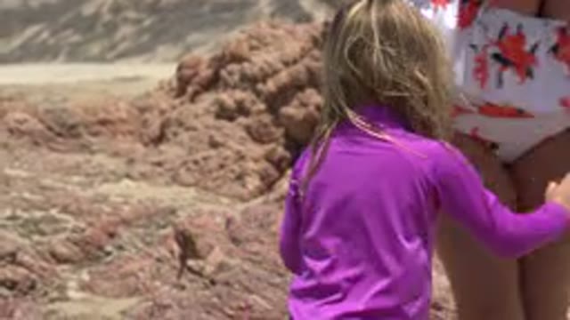 CABO SAN LUCAS MEXICO-2019: Cute Amazing Child And Woman Playing In Sand