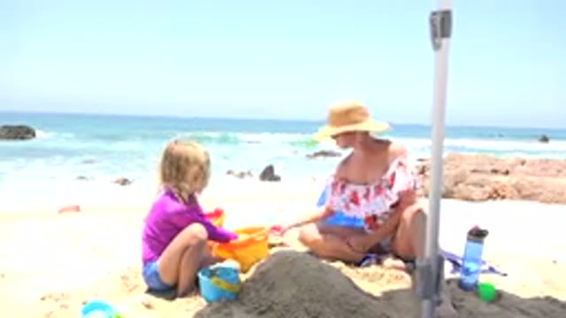 CABO SAN LUCAS MEXICO-2019: Mom And Daughter On The Beach