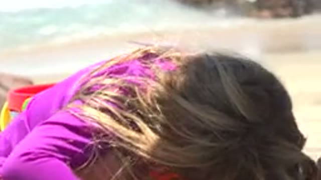 CABO SAN LUCAS MEXICO-2019: Family Enjoying Beach With White Sand And Calm Water