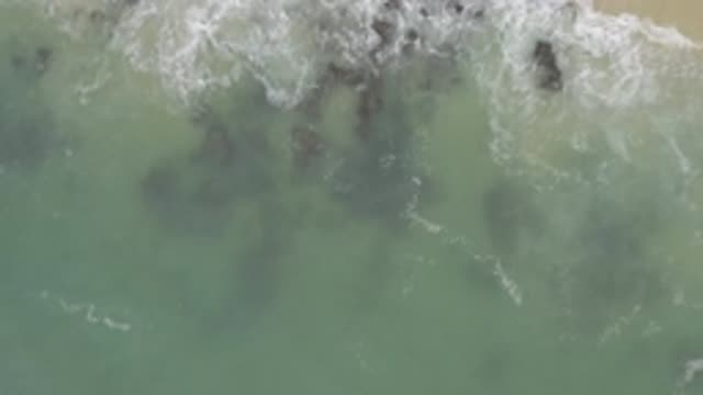 EAST CAPE BCS MEXICO-2017: Drone Ascending Above Shoreline Of Waves Hitting Rocks