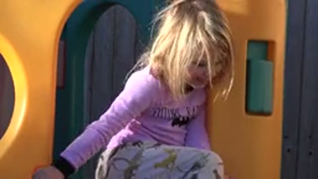 WESTMINSTER COLORADO-2019: A Little Girl Is Playing At The Jungle Gym At The Park
