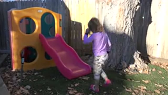 WESTMINSTER COLORADO-2019: Girl Playing in Sand Play Area at Park