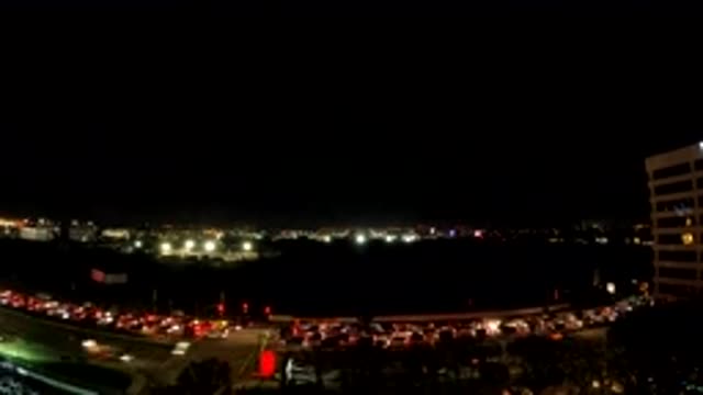 LOS ANGELES CALIFORNIA-2019: White Building And Traffic On A Clear Evening