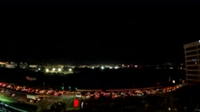 LOS ANGELES CALIFORNIA-2019: Lights Of Fast Moving Cars At Night In Street