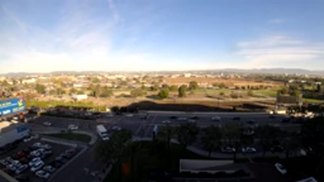 LOS ANGELES CALIFORNIA-2019: Cars On A Road Stopping And Going In A City