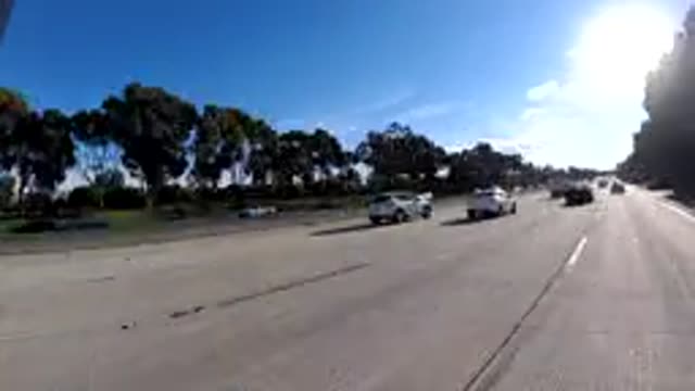 ORANGE COUNTY CALIFORNIA-2019: Agitated Traffic From A Road Shown On An