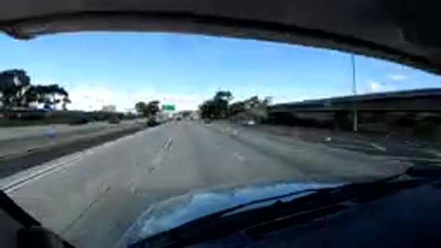 CENTRAL COAST CALIFORNIA-2019: Sped Up Dashboard View Of A Car On The Highway