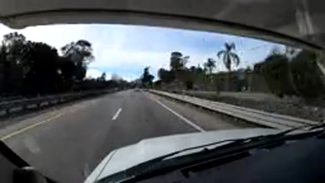 CENTRAL COAST CALIFORNIA-2019: Rapid Approaching Green Trees Along Highway On A