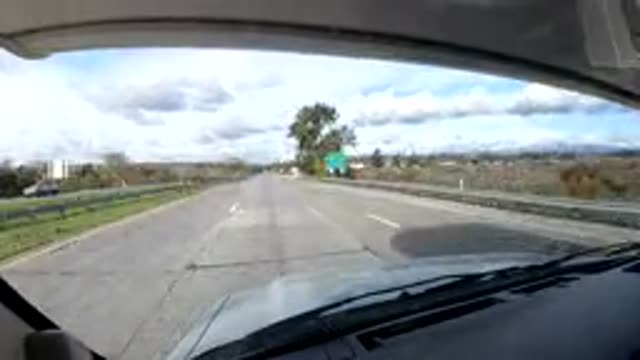 CENTRAL COAST CALIFORNIA-2019: View From Vehicle Driving Down Divided Highway
