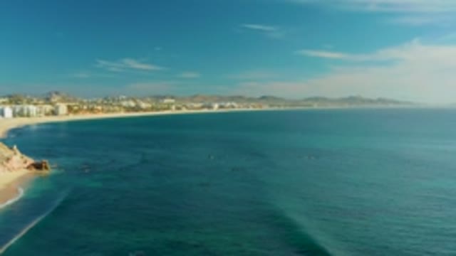 PLAYA ACAPULQUITO LOS CABOS BCS MEXICO-2021: Coastal Beach with Buildings and Clear Ocean