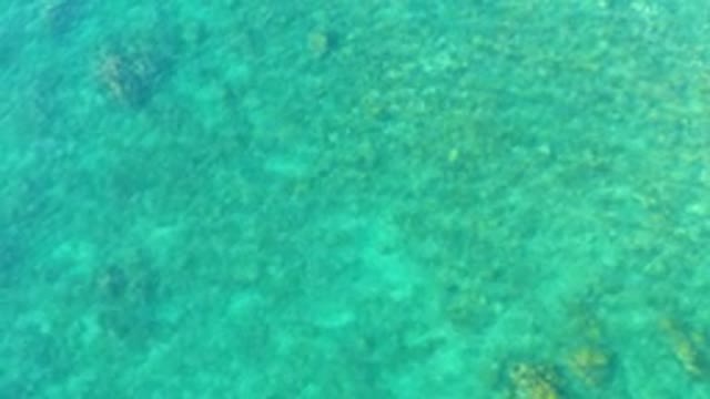 PLAYA ACAPULQUITO LOS CABOS BCS MEXICO-2021: Clear Turquoise Water Over Underwater Rocks