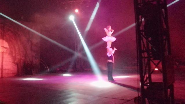 SAN JOSE DEL CABO BCS MEXICO-2022: Acrobatic Duo Performing on a Lit Stage