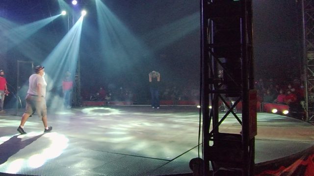 SAN JOSE DEL CABO BCS MEXICO-2022: Dancer Moving Across Stage Under Spotlights and Smoke