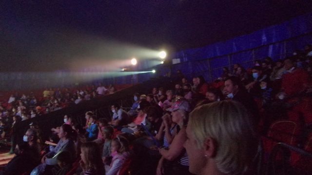 SAN JOSE DEL CABO BCS MEXICO-2022: Crowd Seated in Darkened Performance Venue with Stage Lighting