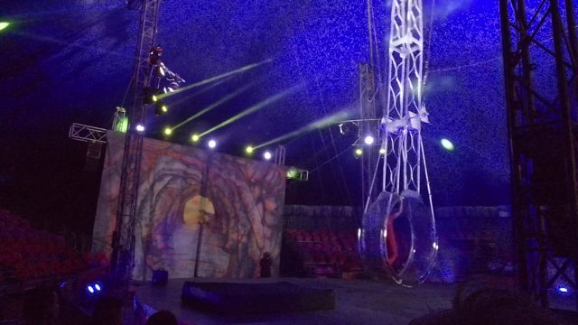 SAN JOSE DEL CABO BCS MEXICO-2022: Aerial Acrobat on Rotating Circular Rig in Indoor Arena