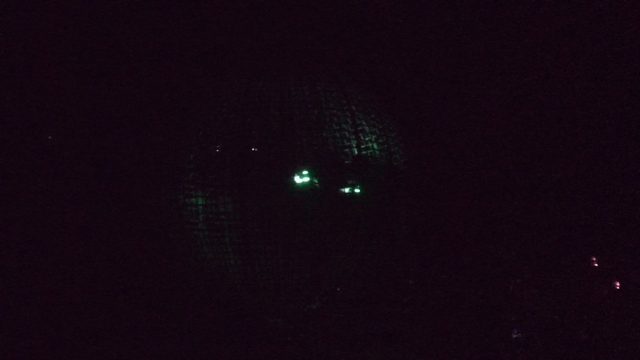 SAN JOSE DEL CABO BCS MEXICO-2022: Performers in a Large Glowing Spherical Cage at Night
