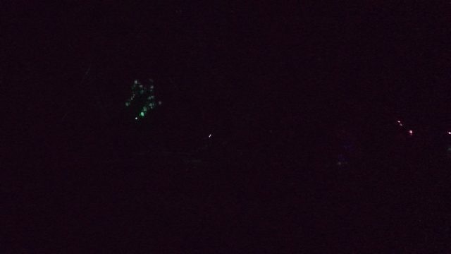 SAN JOSE DEL CABO BCS MEXICO-2022: Glowing Green Light Display with Red Accents at Night