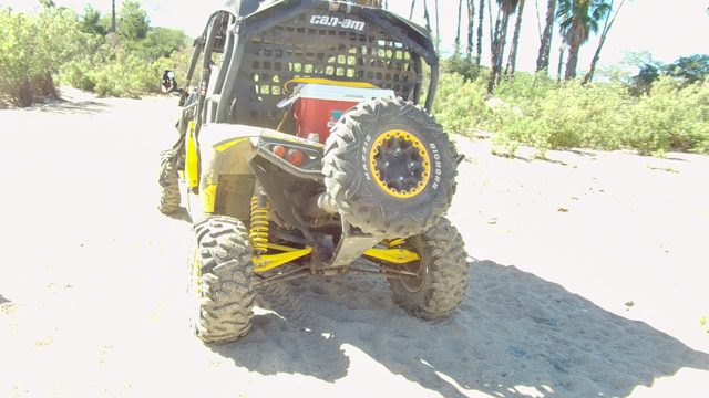 LOS CABOS BCS MEXICO-2022: Off-Road Vehicle on Sandy Path with Shadow