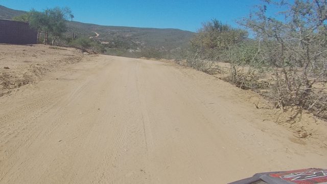 LOS CABOS BCS MEXICO-2022: Dirt Road Winding Through Arid Hills