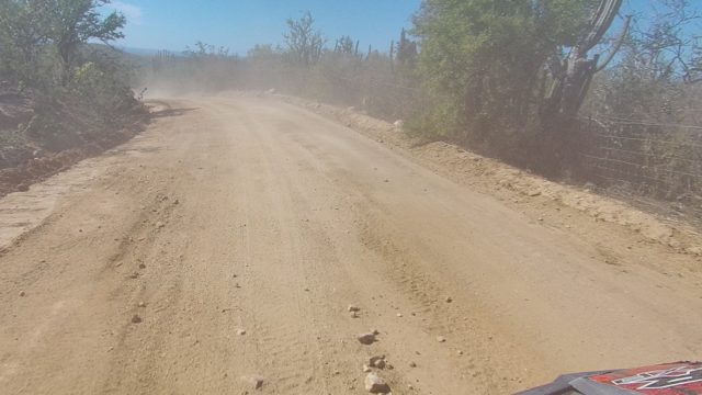 LOS CABOS BCS MEXICO-2022: Vehicle Traveling on Dusty Unpaved Road