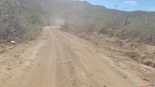 LOS CABOS BCS MEXICO-2022: Vehicle Driving on Dusty Mountain Dirt Road