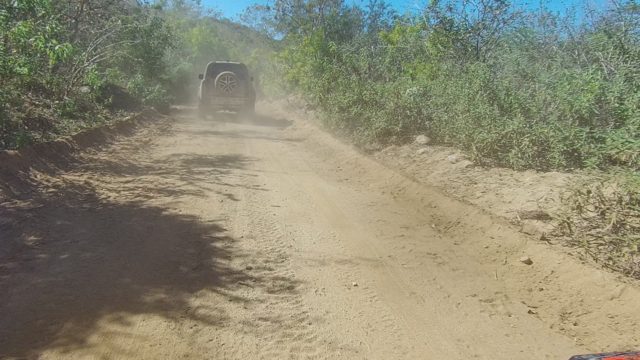 LOS CABOS BCS MEXICO-2022: SUV Driving on a Dusty Forest Road