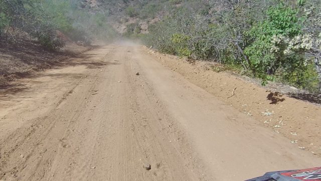 LOS CABOS BCS MEXICO-2022: Vehicle Moving Along Dry Mountain Dirt Road