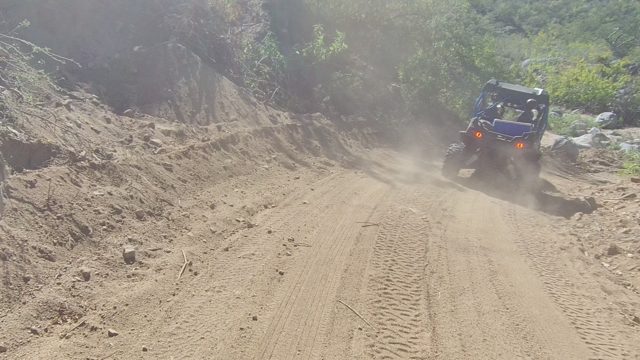 LOS CABOS BCS MEXICO-2022: Off-Road Vehicle Navigating Dusty Mountain Trail