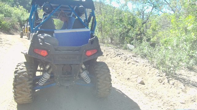 LOS CABOS BCS MEXICO-2022: UTV with Passengers Driving on a Dirt Trail