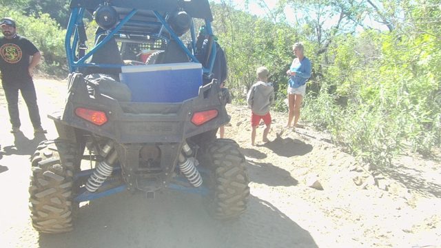 LOS CABOS BCS MEXICO-2022: Group of People near a Blue Off-road Vehicle on a Dirt Trail
