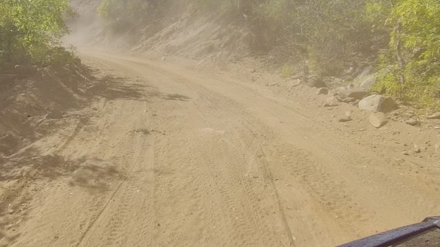 LOS CABOS BCS MEXICO-2022: Dusty Dirt Road Drive Through Mountainous Terrain