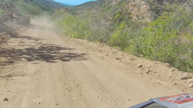 LOS CABOS BCS MEXICO-2022: Vehicle Traveling on Dusty Mountain Dirt Road