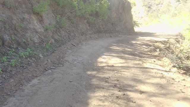 LOS CABOS BCS MEXICO-2022: Narrow Dirt Road Winding Through Mountainous Terrain