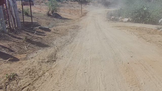 LOS CABOS BCS MEXICO-2022: Vehicle Driving on a Dusty Rural Dirt Road