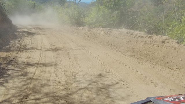 LOS CABOS BCS MEXICO-2022: Vehicle Traveling on Dusty Rural Dirt Road