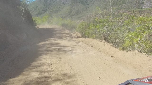 LOS CABOS BCS MEXICO-2022: Dusty Dirt Road Drive Through Hilly Terrain