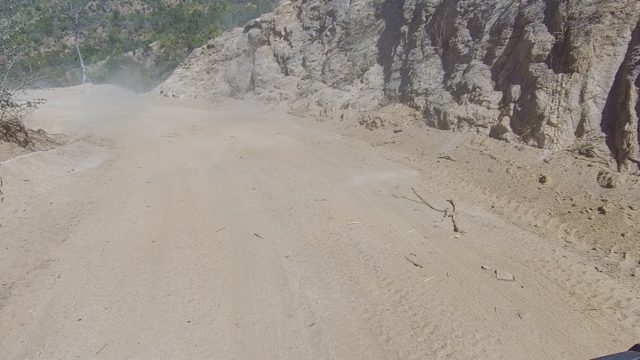 LOS CABOS BCS MEXICO-2022: Vehicle Traveling on Dusty Mountain Dirt Road