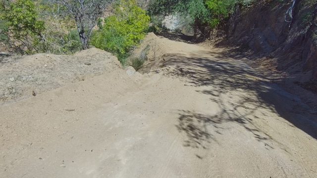 LOS CABOS BCS MEXICO-2022: Dirt Road Drive Through Hilly, Tree-lined Landscape