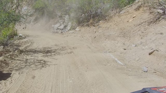 LOS CABOS BCS MEXICO-2022: Vehicle Driving on Dusty Mountain Dirt Road