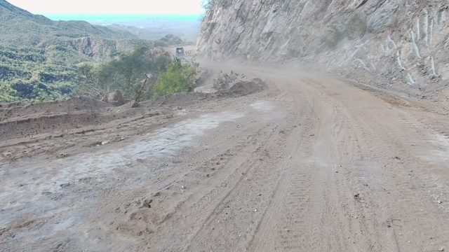 LOS CABOS BCS MEXICO-2022: Dusty Mountain Dirt Road From Moving Vehicle