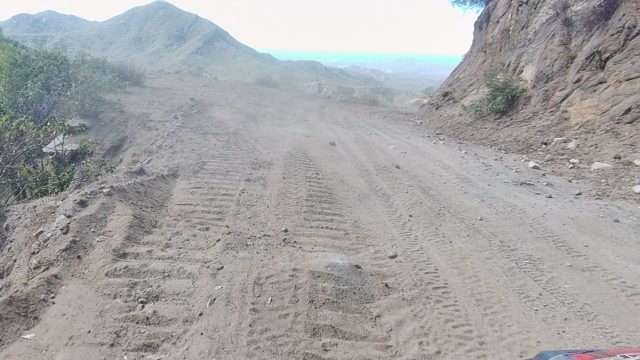 LOS CABOS BCS MEXICO-2022: Vehicle Moving Along Mountain Dirt Road