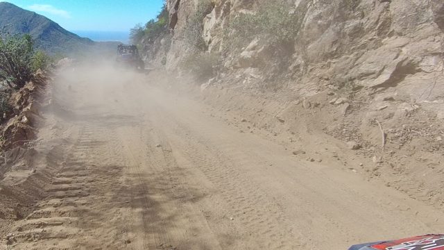 LOS CABOS BCS MEXICO-2022: Vehicle Traveling on Dusty Mountain Dirt Road