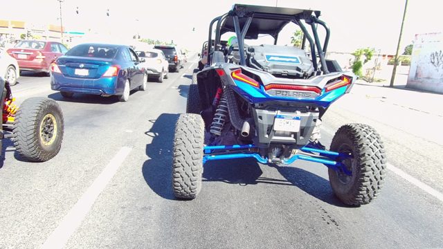 LOS CABOS BCS MEXICO-2022: UTV and Cars Moving on Paved Road