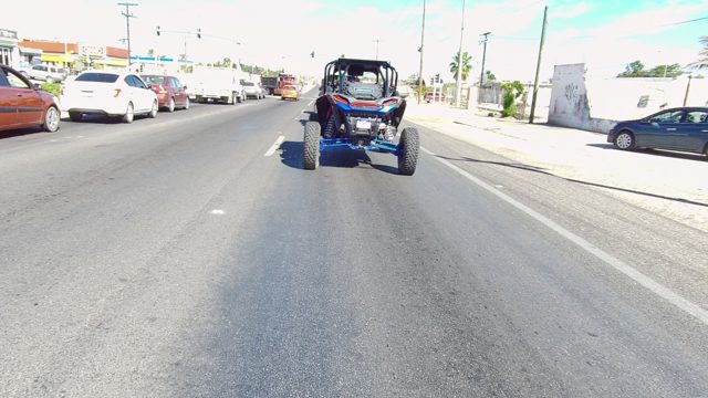 LOS CABOS BCS MEXICO-2022: Blue UTV Driving on a Multi-Lane Urban Road