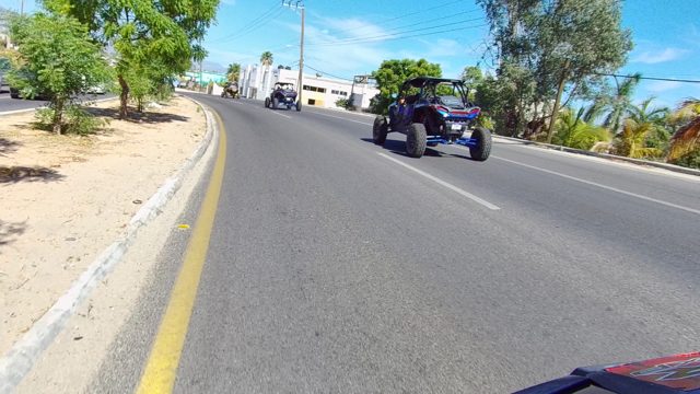 LOS CABOS BCS MEXICO-2022: Off-Road Vehicles Traveling on a Paved Road